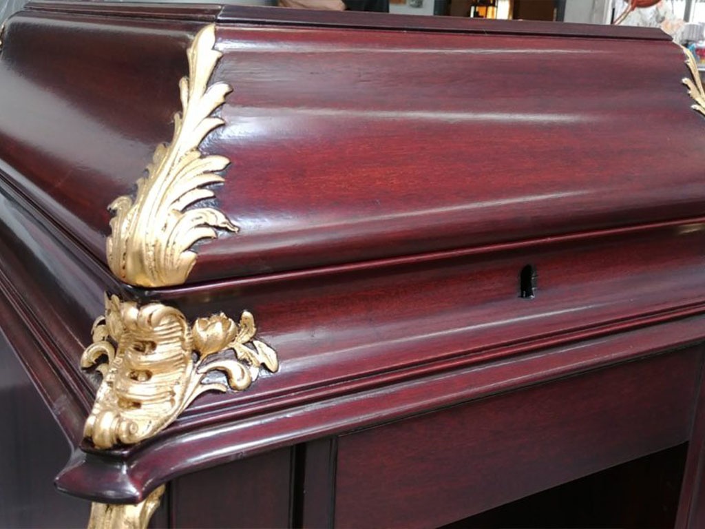 A restored antique Victrola cabinet