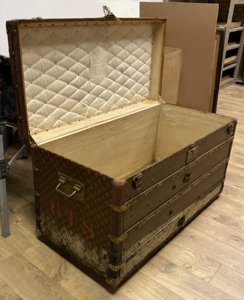 Antique Louis Vuitton Tall Ladies Steamer Trunk Before Conservation Antique trunk restoration Chicago Conservation Chicago Provenance conservation Antique restoration Antique conservation Trunk repair Louis Vuitton Trunk repair Antique Water restoration Artifact services Chicago Artmill Group Armand Lee The Repair Shop Chicago Artifact services claim restoration Antique repair Fine art conservation Heirloom Restoration Art conservation services Water damage restoration April Hann Lanford